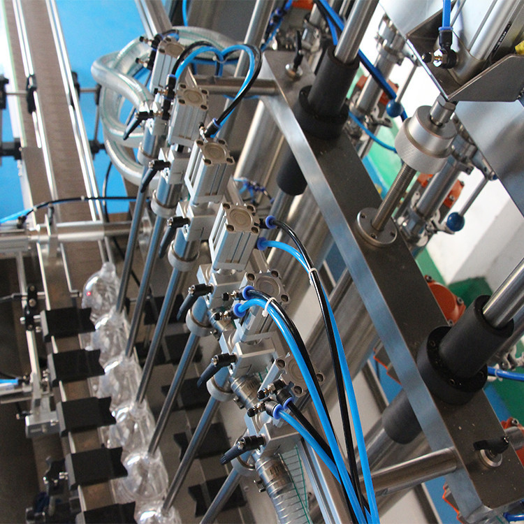 peiriant llenwi olew